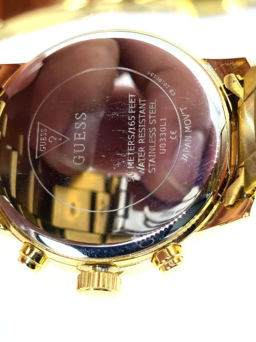 GUESS U0330L1 Women's Gold-Tone Multifunction Bracelet Watch